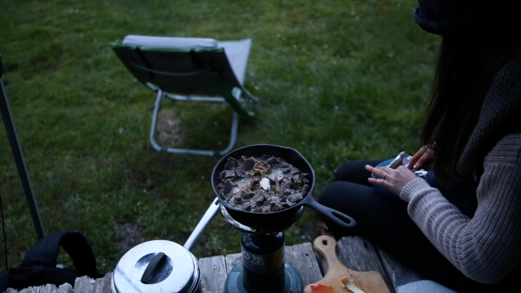 easy camping food woman cooking steak leftovers