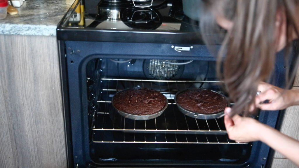two chocolate cake tins in the oven